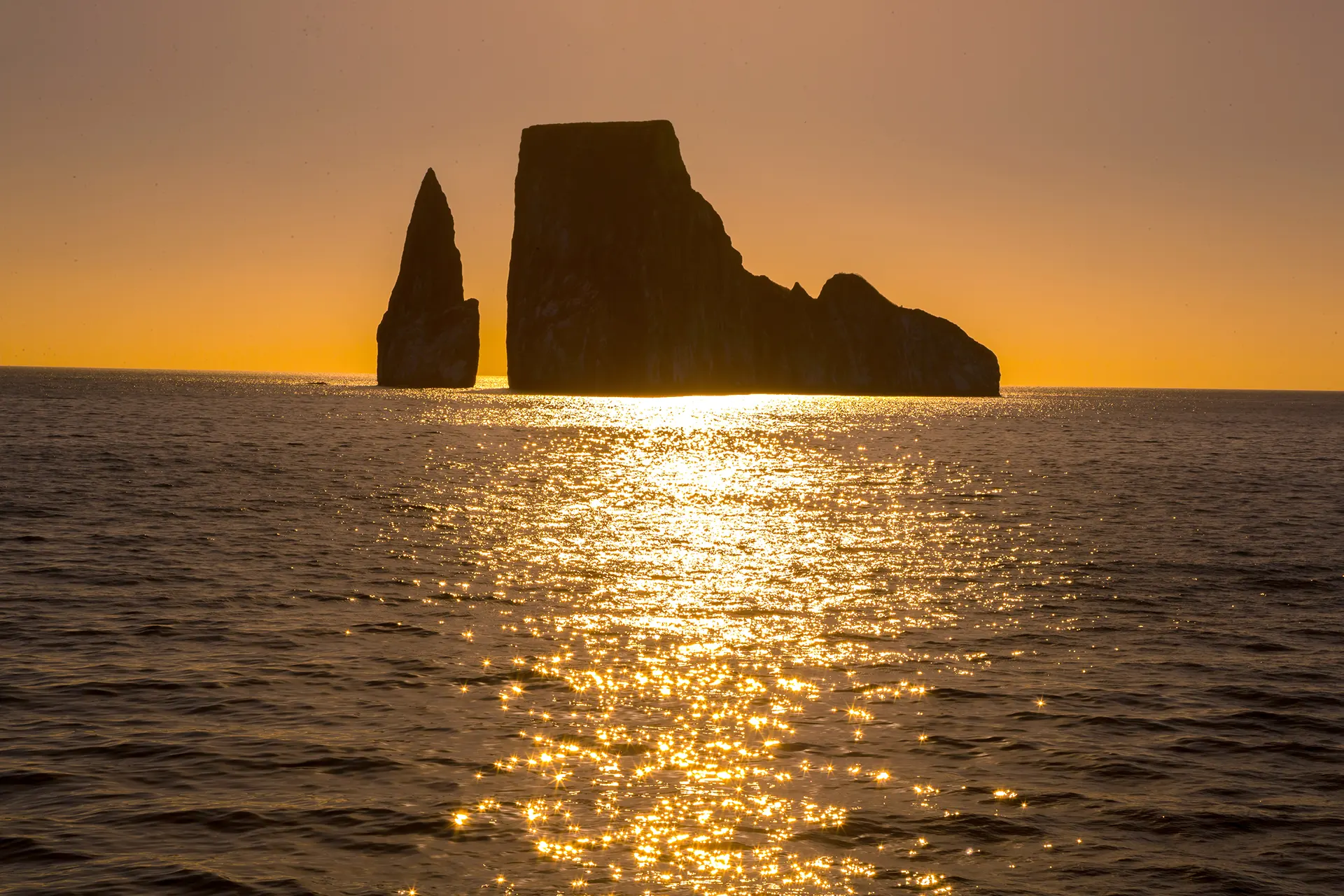 Sunset over a volcanic rock in the Galápagos